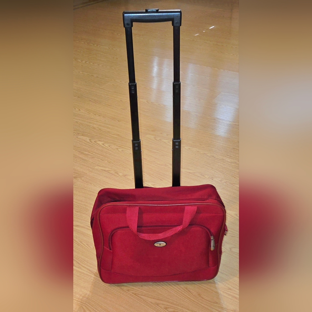 Pacific Coast Rolling Red Carry-onTravel Bag approx  17x15x8"